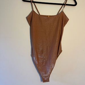 SKIMS BODYSUIT GOLD MEDIUM